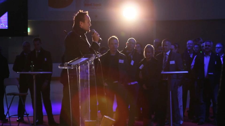 A man onstage at an event